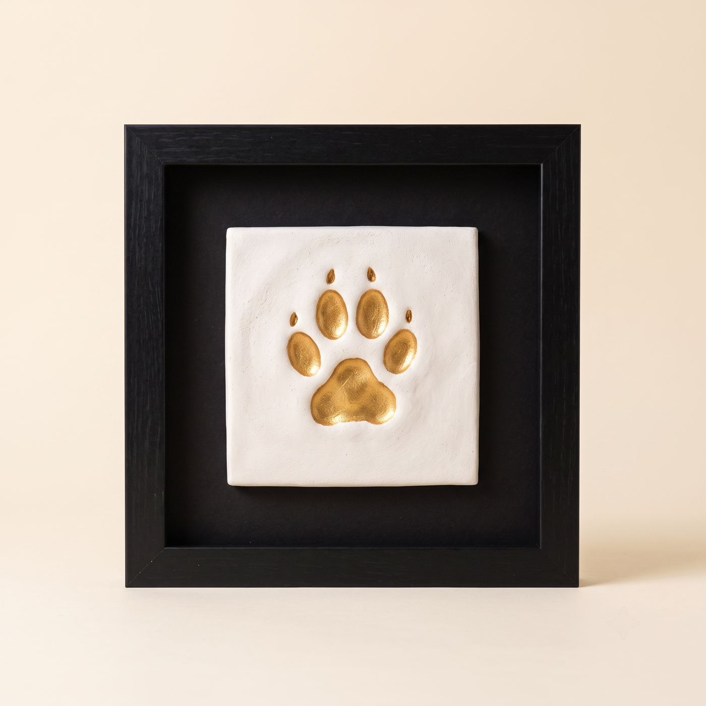 Day 30, the paw print painted gold and framed